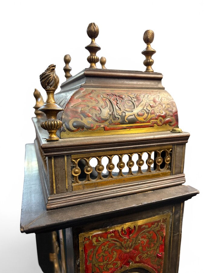 19th-century religious pendule in Boulle marquetry. Boulle marquetry cabinet by Gérard of Liège, from the Napoleonic period, in the Louis XIV Regency style. Beautiful cabinet design; the front features a door flanked by two Boulle pilasters 