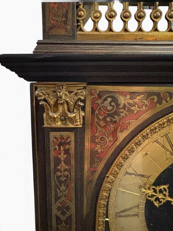 19th-century religious pendule in Boulle marquetry. Boulle marquetry cabinet by Gérard of Liège, from the Napoleonic period, in the Louis XIV Regency style. Beautiful cabinet design; the front features a door flanked by two Boulle pilasters 
