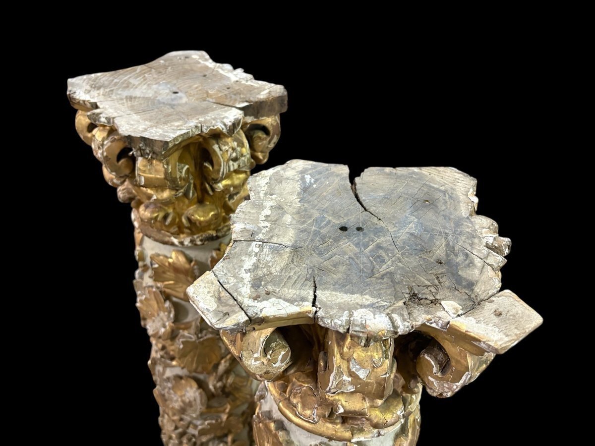 Pair of 17thC. Baroque twisted columns. Decorative columns adorned with vines, birds and Corinthian capitals covered with antique gilding and polychrome decoration.Columns in good condition with wear to the wood, gilding and polychrome.