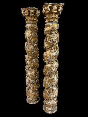 Pair of 17thC. Baroque twisted columns. Decorative columns adorned with vines, birds and Corinthian capitals covered with antique gilding and polychrome decoration.Columns in good condition with wear to the wood, gilding and polychrome.