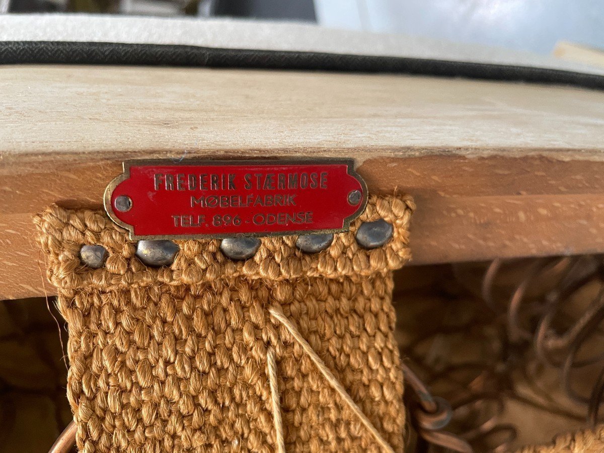 Pair of Danish design armchairs signed 1940. Armchairs covered with a new tapestry. The armchairs have a plate at the bottom. : Frederik Staermose Mobelfabric Odense Dimensions: Height: 86 cm Width : 66 cm Depth: 86 cm Comfortable seats