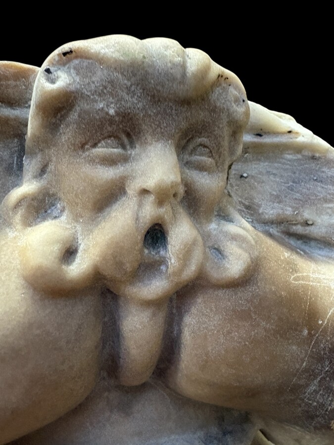 17th-century Renaissance marble fireplace. Beautiful columns from a Renaissance-era fireplace, in the Flemish style, dating from around 1600. Two white marble columns with Corinthian capitals, adorned with mythological figures