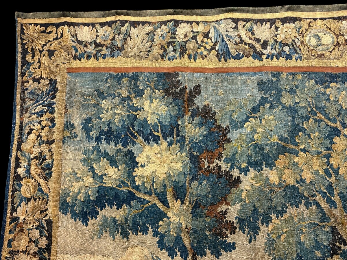 17thC. Flemish ‘Verdure’ wool tapestry from Oudenaarde, dating 1680–1700, depicting a court or hunting scene featuring animals, a woodland landscape and noble figures. 