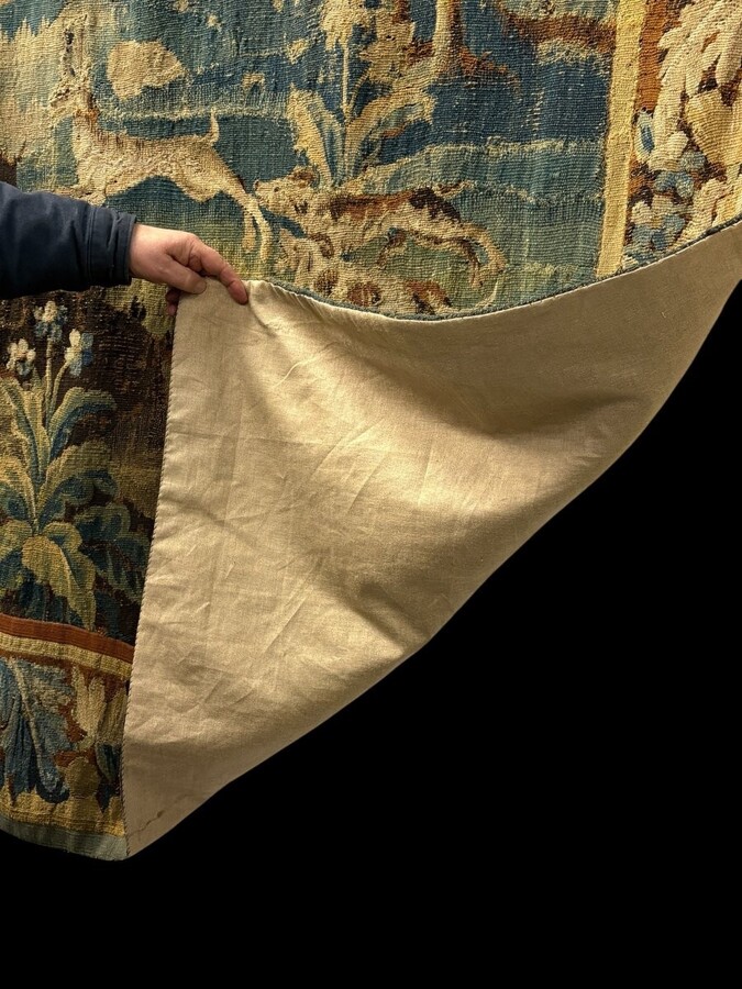 17thC. Flemish ‘Verdure’ wool tapestry from Oudenaarde, dating 1680–1700, depicting a court or hunting scene featuring animals, a woodland landscape and noble figures.