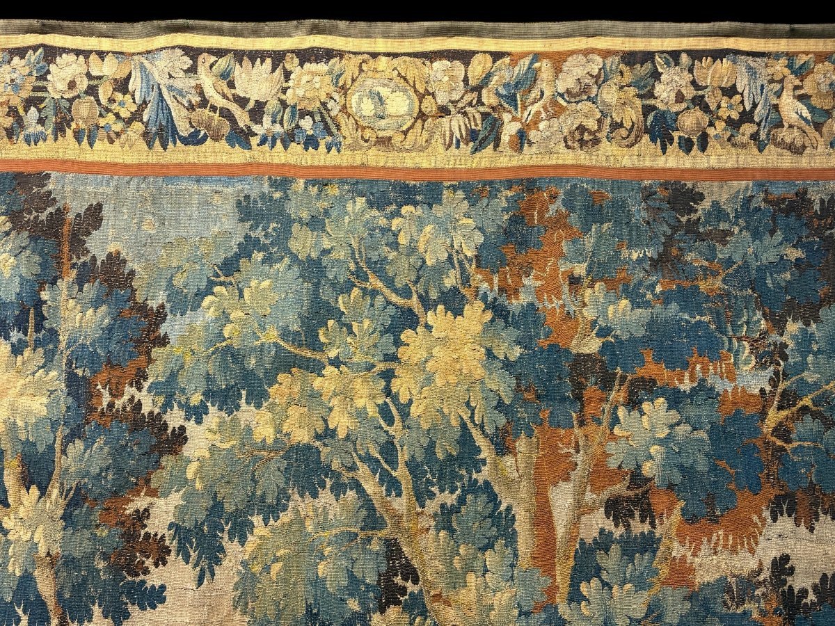 17thC. Flemish ‘Verdure’ wool tapestry from Oudenaarde, dating 1680–1700, depicting a court or hunting scene featuring animals, a woodland landscape and noble figures.