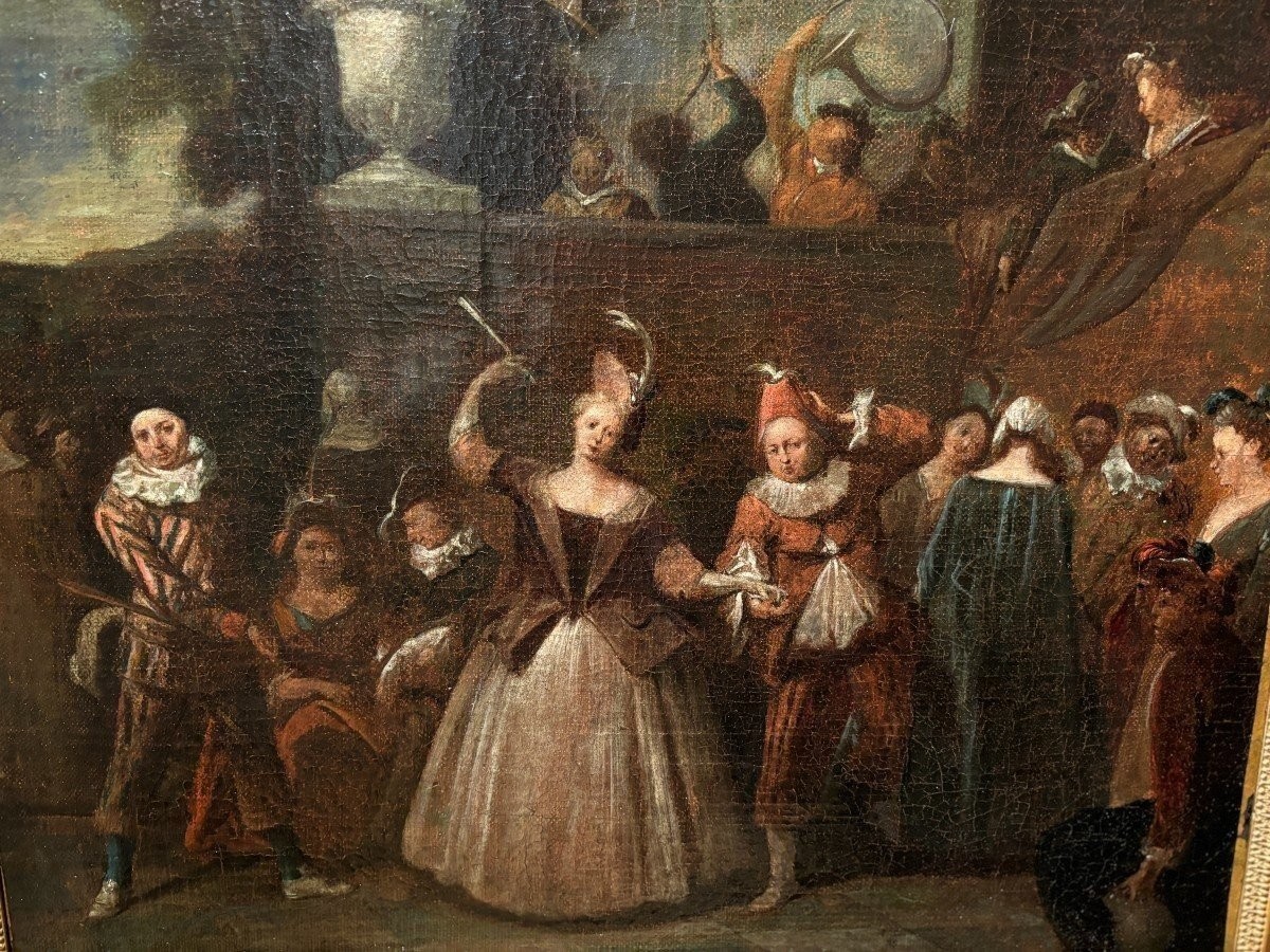 18th century painting ‘Dance scene with Harlequin’ oil on canvas. Decorative painting depicting a dance scene of nobles with a harlequin in a city garden in a beautiful gilt Empire frame.