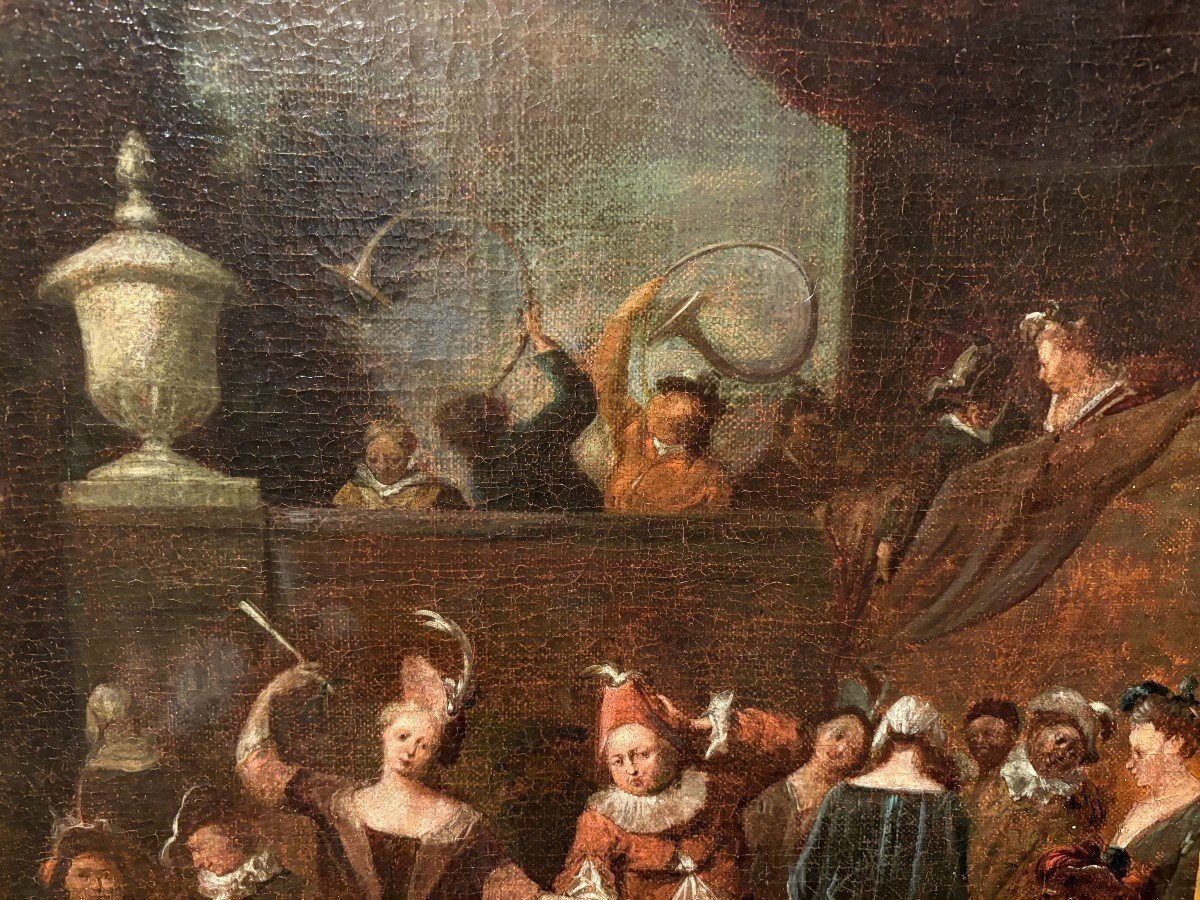 18th century painting ‘Dance scene with Harlequin’ oil on canvas. Decorative painting depicting a dance scene of nobles with a harlequin in a city garden in a beautiful gilt Empire frame.