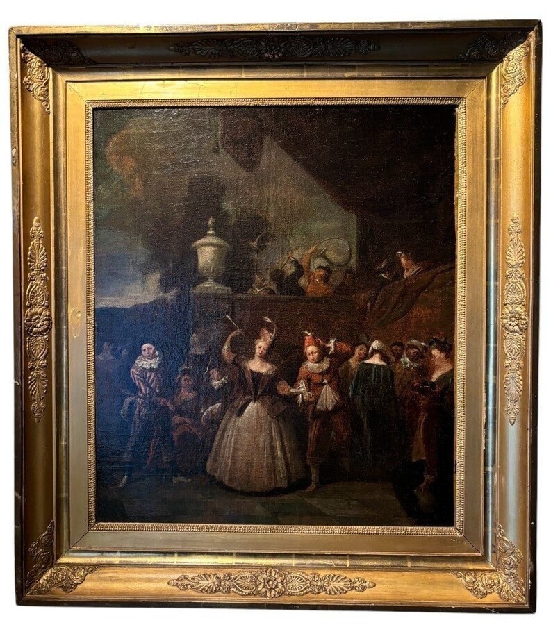 18th century painting ‘Dance scene with Harlequin’ oil on canvas. Decorative painting depicting a dance scene of nobles with a harlequin in a city garden in a beautiful gilt Empire frame.