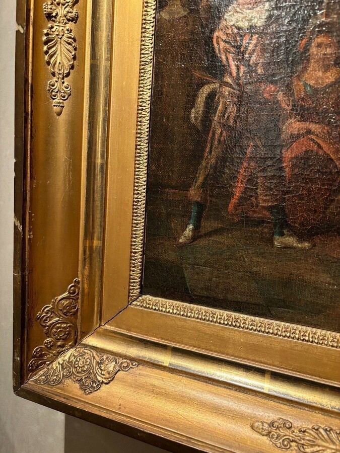 18th century painting ‘Dance scene with Harlequin’ oil on canvas. Decorative painting depicting a dance scene of nobles with a harlequin in a city garden in a beautiful gilt Empire frame.