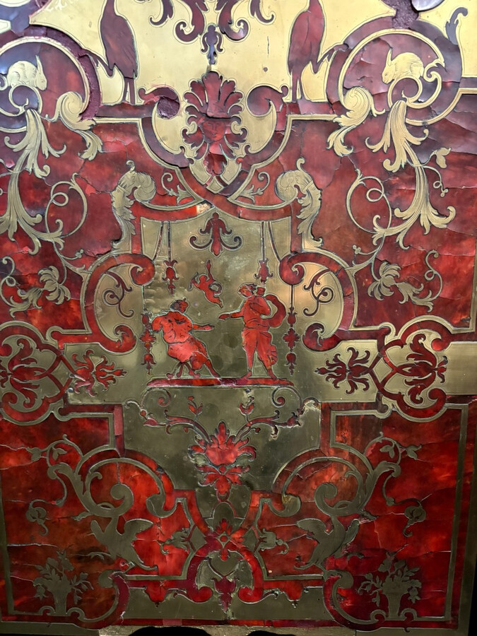 19th century Boulle marquetry sideboard in blackened pear wood inlaid with copper filigree, red tortoiseshell and copper veneer. (restoration required). Chiselled and gilded bronze decorations with acanthus leaves, clasps and rosettes. Black marble top.