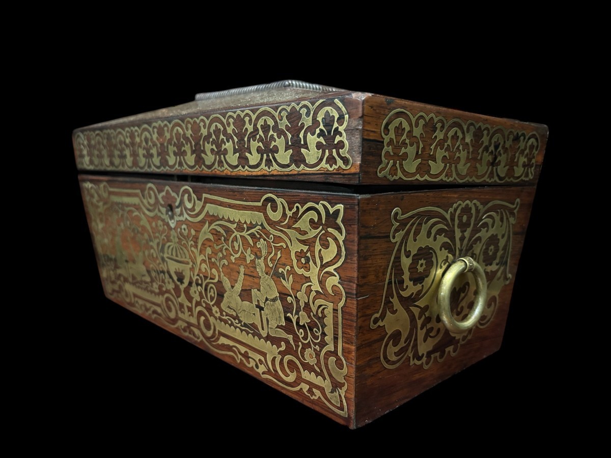 19th century Boulle marquetry tea caddy. Beautiful decorative tea caddy with fine Boulle marquetry decoration. Dimensions: Width: 38cm Height : 20cm Depth : 19,5 cm In very good condition, 19th century key missing