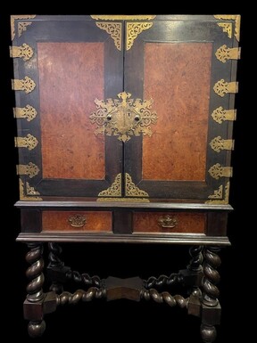 19th century colonial cabinet in ebony and burnt wood. Beautiful piece of furniture in 2 parts decorated with numerous bronze fittings and behind the 2 doors equipped with 9 drawers and 2 in the base. Dimensions : Height: 158 cm Width : 104 cm Depth : 46