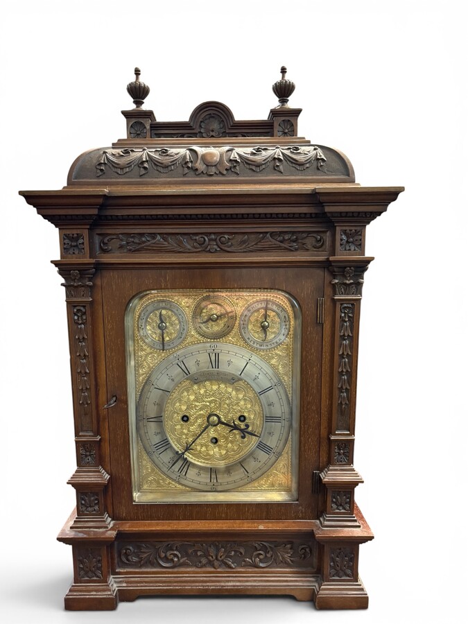 ‘8-bell’ Bracket Clock, Glasgow, 19thC. A very fine bracket clock with exquisitely carved details and a richly decorated bronze dial. The dial is signed C. Edward & Sons, Glasgow. The mechanism is fitted with 8 bells and 5 gongs. 