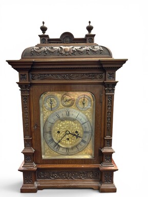 ‘8-bell’ Bracket Clock, Glasgow, 19thC. A very fine bracket clock with exquisitely carved details and a richly decorated bronze dial. The dial is signed C. Edward & Sons, Glasgow. The mechanism is fitted with 8 bells and 5 gongs. 