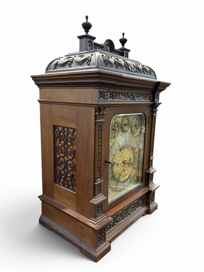 ‘8-bell’ Bracket Clock, Glasgow, 19thC. A very fine bracket clock with exquisitely carved details and a richly decorated bronze dial. The dial is signed C. Edward & Sons, Glasgow. The mechanism is fitted with 8 bells and 5 gongs. 