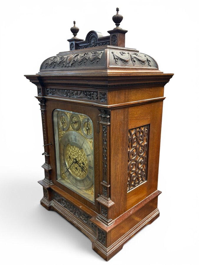 ‘8-bell’ Bracket Clock, Glasgow, 19thC. A very fine bracket clock with exquisitely carved details and a richly decorated bronze dial. The dial is signed C. Edward & Sons, Glasgow. The mechanism is fitted with 8 bells and 5 gongs. 