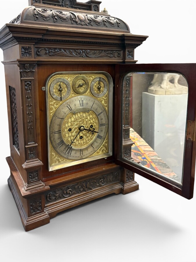 ‘8-bell’ Bracket Clock, Glasgow, 19thC. A very fine bracket clock with exquisitely carved details and a richly decorated bronze dial. The dial is signed C. Edward & Sons, Glasgow. The mechanism is fitted with 8 bells and 5 gongs. 