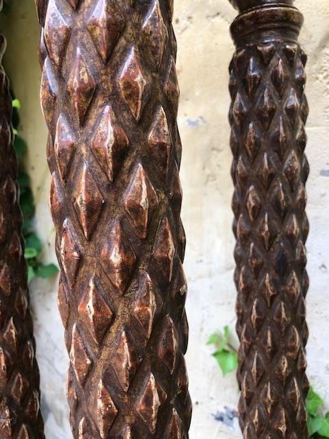 A gilded wooden pedestal with four columns 18th Century. Renaissance style with angel heads. In very good condition with following dimensions : Height : 127 cm Width above : 27 x 27 cm Foot : 38.5 x 39 cm