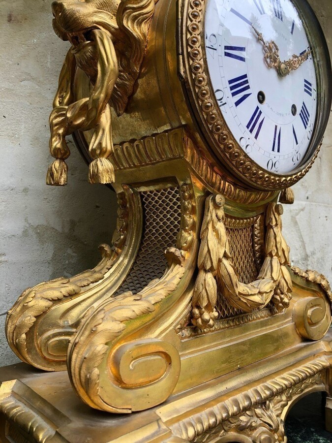 A Large Gilt Bronze LXVI Style Mantelpiece Paris, 19th Century. The Clock And The Candelabras Are Gilded With Matt And Bright Gold. Clock Signed By G.Philippe, Palais Royal 66 & 67 In Paris. Dimensions Clock: 68 Cm High, 42 Cm Wide And 24 Cm Deep.