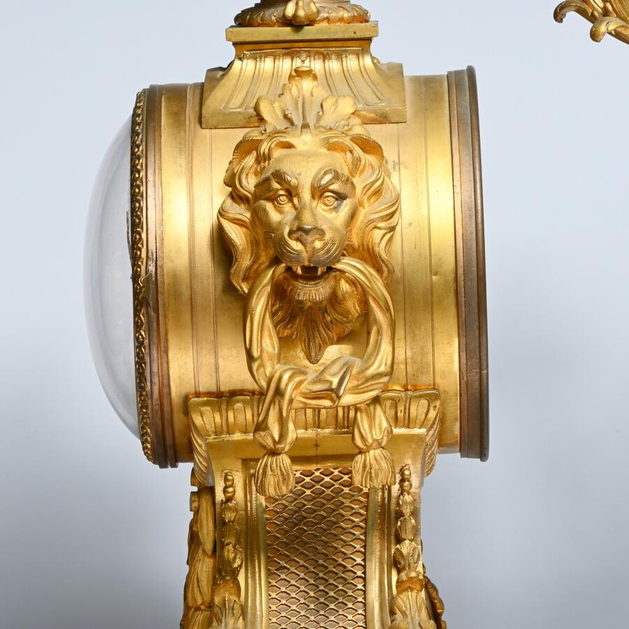 A Large Gilt Bronze LXVI Style Mantelpiece Paris, 19th Century. The Clock And The Candelabras Are Gilded With Matt And Bright Gold. Clock Signed By G.Philippe, Palais Royal 66 & 67 In Paris. Dimensions Clock: 68 Cm High, 42 Cm Wide And 24 Cm Deep.