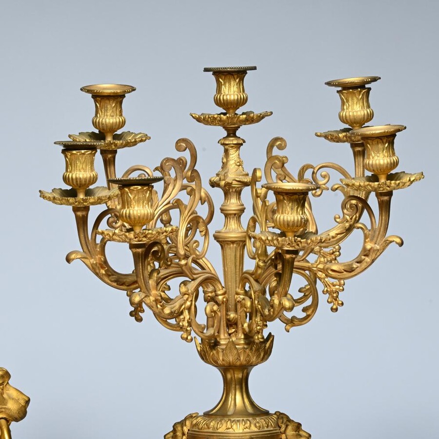 A Large Gilt Bronze LXVI Style Mantelpiece Paris, 19th Century. The Clock And The Candelabras Are Gilded With Matt And Bright Gold. Clock Signed By G.Philippe, Palais Royal 66 & 67 In Paris. Dimensions Clock: 68 Cm High, 42 Cm Wide And 24 Cm Deep.
