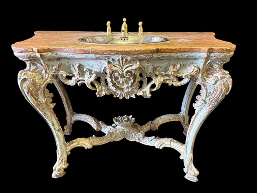 A nice 18thC. console table with a marble-effect wooden top, recently fitted with a metal washbasin and bronze taps (which have never been connected...) The console table is in good condition, showing slight signs of wear and some old paintwork. 