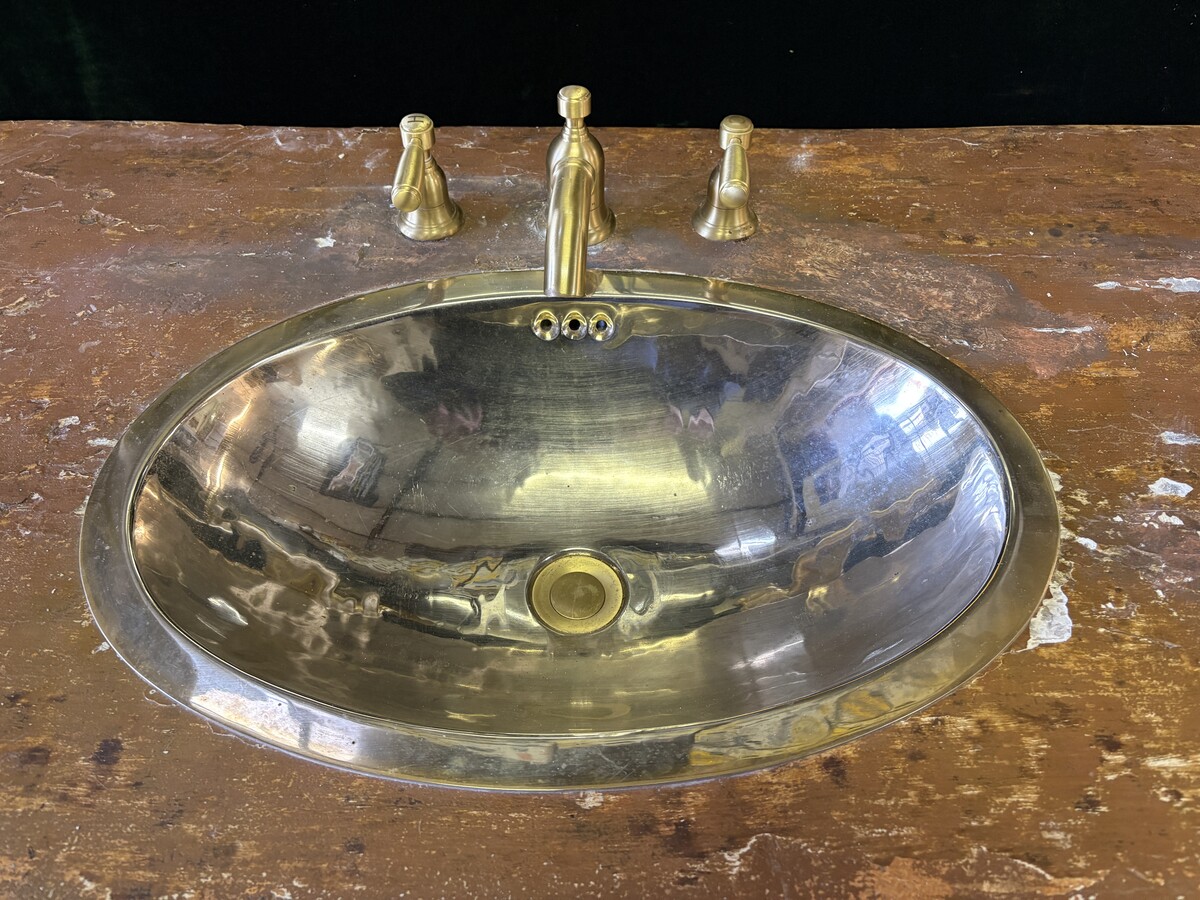 A nice 18thC. console table with a marble-effect wooden top, recently fitted with a metal washbasin and bronze taps (which have never been connected...) The console table is in good condition, showing slight signs of wear and some old paintwork. 