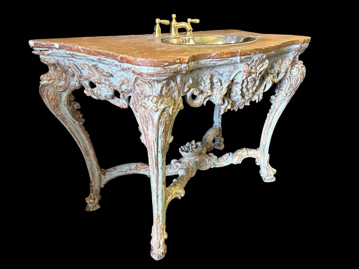 A nice 18thC. console table with a marble-effect wooden top, recently fitted with a metal washbasin and bronze taps (which have never been connected...) The console table is in good condition, showing slight signs of wear and some old paintwork. 