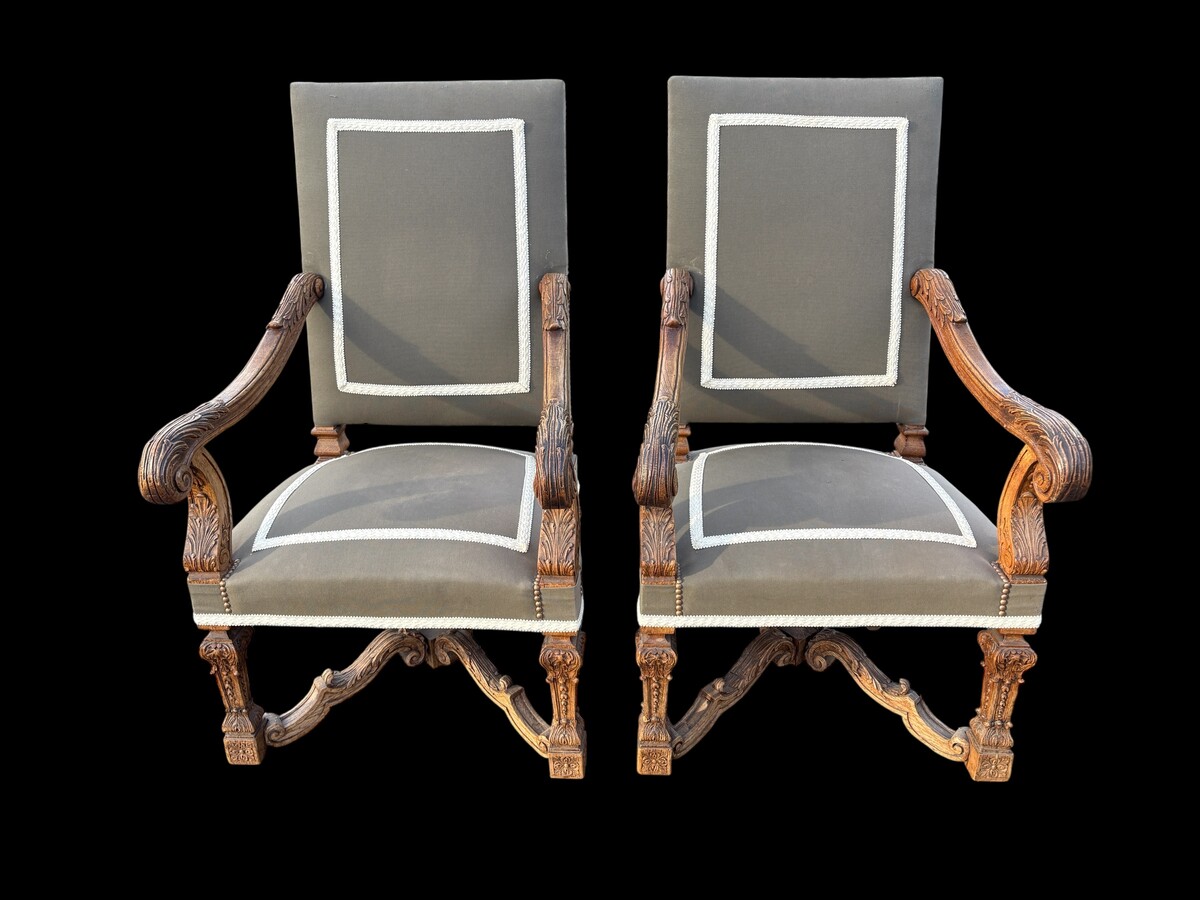 A pair of large 19th-century Regency-style oak armchairs. Decorative oak armchairs, upholstered in taupe fabric with a lace ribbon border. Dimensions: Height: 121 cm Width: 67 cm Depth: 70 cm