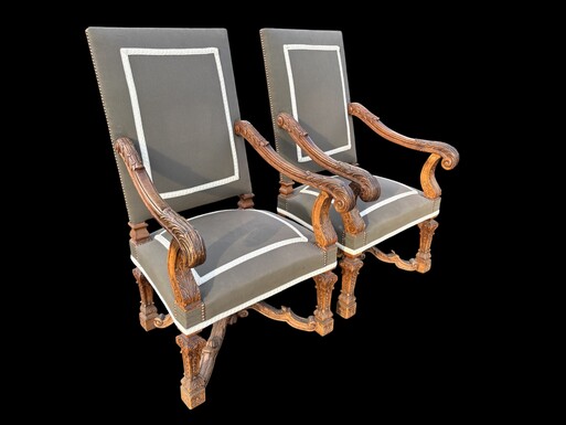 A pair of large 19th-century Regency-style oak armchairs. Decorative oak armchairs, upholstered in taupe fabric with a lace ribbon border. Dimensions: Height: 121 cm Width: 67 cm Depth: 70 cm