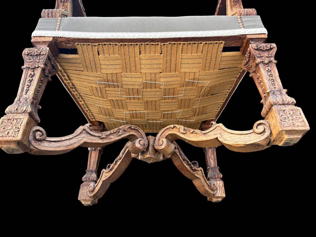 A pair of large 19th-century Regency-style oak armchairs. Decorative oak armchairs, upholstered in taupe fabric with a lace ribbon border. Dimensions: Height: 121 cm Width: 67 cm Depth: 70 cm