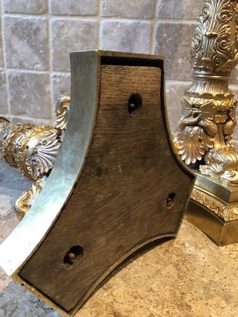 A pair of large gilded bronze candlesticks/lamp bases Charles X , some fish tails(3) are missing. Dimensions : 54 cm high and 23 cm wide.