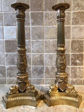 A pair of large gilded bronze candlesticks/lamp bases Charles X , some fish tails(3) are missing. Dimensions : 54 cm high and 23 cm wide.