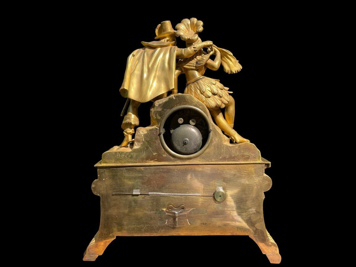 A Quality Early 19th Century Gilded Bronze Pendule. Dimensions : Height : 51 Cm , Wide 40 Cm , Depth : 14 Cm