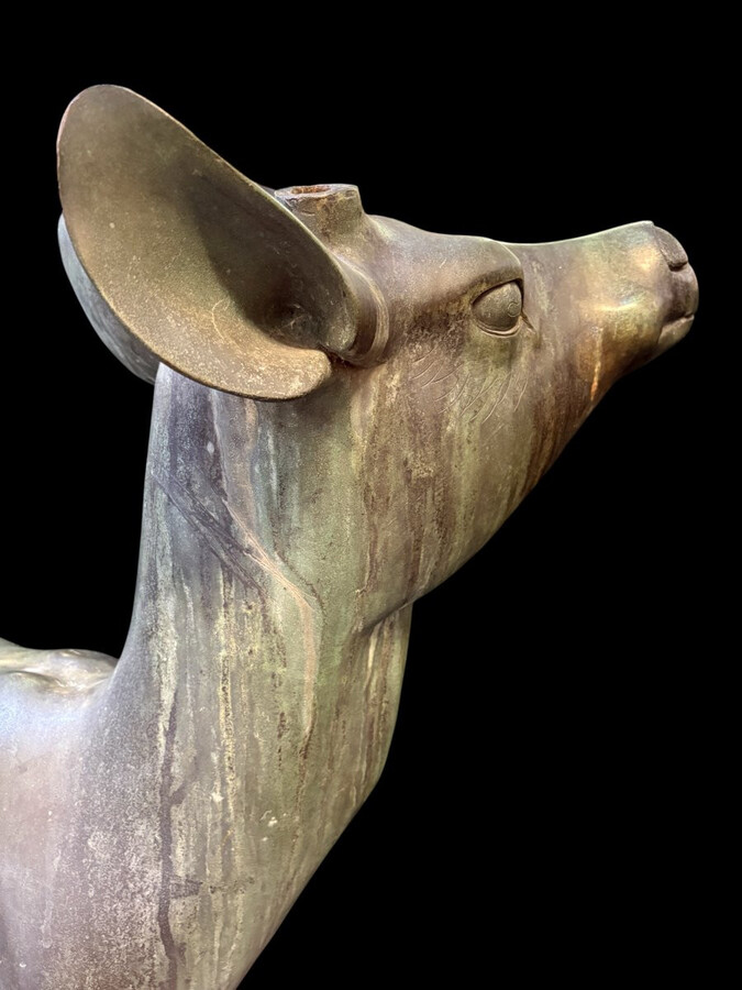 A superb 19thC. pair of life-size bronze sculptures depicting a doe and a stag, exquisitely detailed and featuring a magnificent antique patina. The deer show signs of wear and have undergone some previous restoration