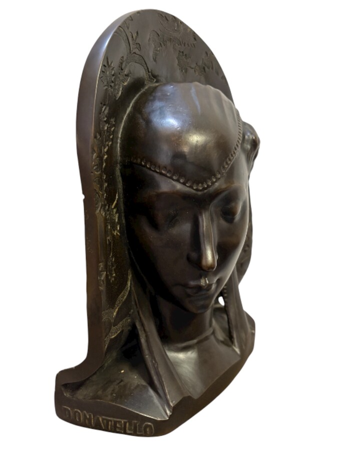 Bas-relief depicting a noble lady in bronze after Donatello, 1880–1900 Brown patinated bronze bas-relief depicting a noble Burgundian lady with the inscription DONATELLO on the side (circa 1386-1466) 