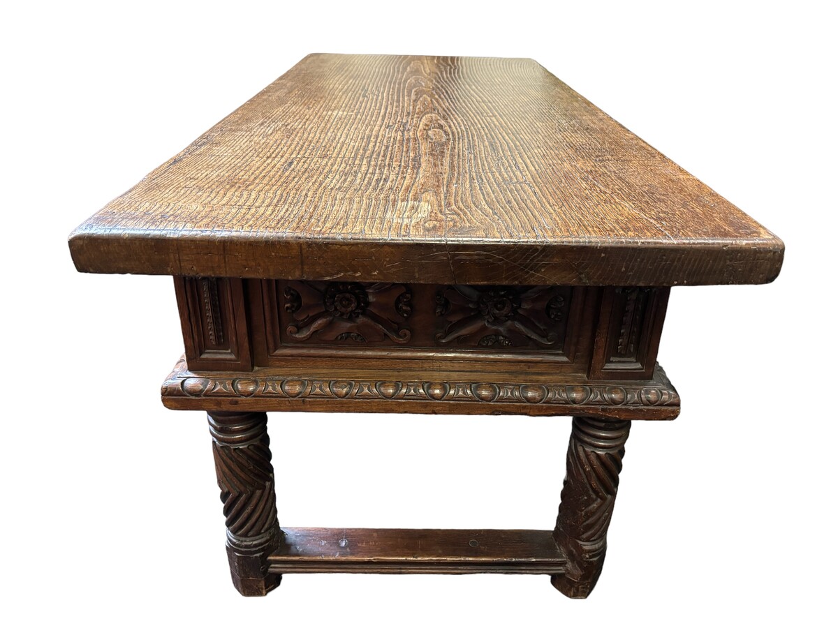 Beautiful Spanish table in Chestnut wood 17th century. Large sturdy table finished on 4 sides with beautiful wood carved decorations and fitted with 3 large drawers at the front. Beautiful thick top of 5 cm. Table in good condition