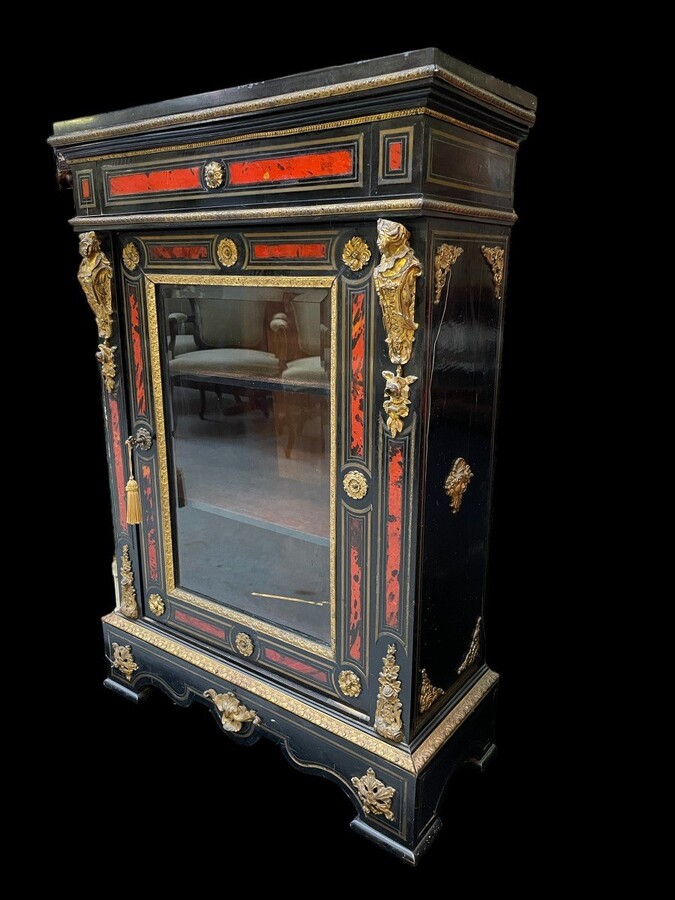 Boulle cabinet / display case inlaid with tortoiseshell 19th century. One-door cabinet decorated with gilt bronze ornaments, copper inlay and tortoiseshell inlay. Black marble top. Furniture needs some small restorations ( copper inlay ).