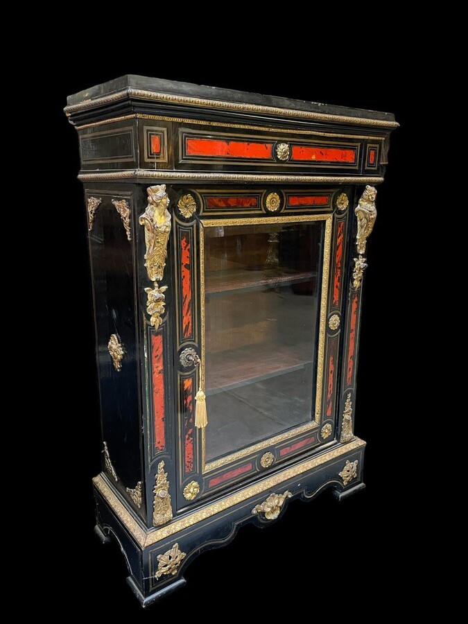 Boulle cabinet / display case inlaid with tortoiseshell 19th century. One-door cabinet decorated with gilt bronze ornaments, copper inlay and tortoiseshell inlay. Black marble top. Furniture needs some small restorations ( copper inlay ).