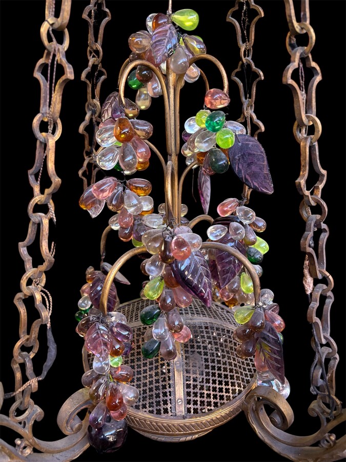 Bronze chandelier with glass fruit decorations 19th century Pretty ormolu chandelier decorated with an openwork basket and all sorts of coloured glass fruit. The chandelier has a total of 6 light points (electricity to be renewed). 