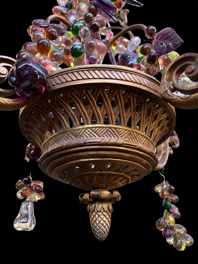 Bronze chandelier with glass fruit decorations 19th century Pretty ormolu chandelier decorated with an openwork basket and all sorts of coloured glass fruit. The chandelier has a total of 6 light points (electricity to be renewed). 