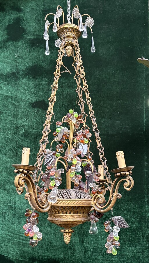 Bronze chandelier with glass fruit decorations 19th century Pretty ormolu chandelier decorated with an openwork basket and all sorts of coloured glass fruit. The chandelier has a total of 6 light points (electricity to be renewed). 