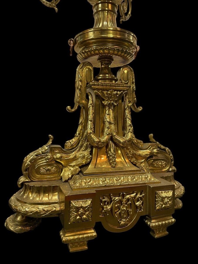 Bronze mantelpiece in the Louis XVI style 19th century. Good condition, movement to be checked, 2 wicks missing. Dimensions Clock : Height : 50 cm Width : 46 cm Depth : 18 cm Height of candelabra : 58 cm