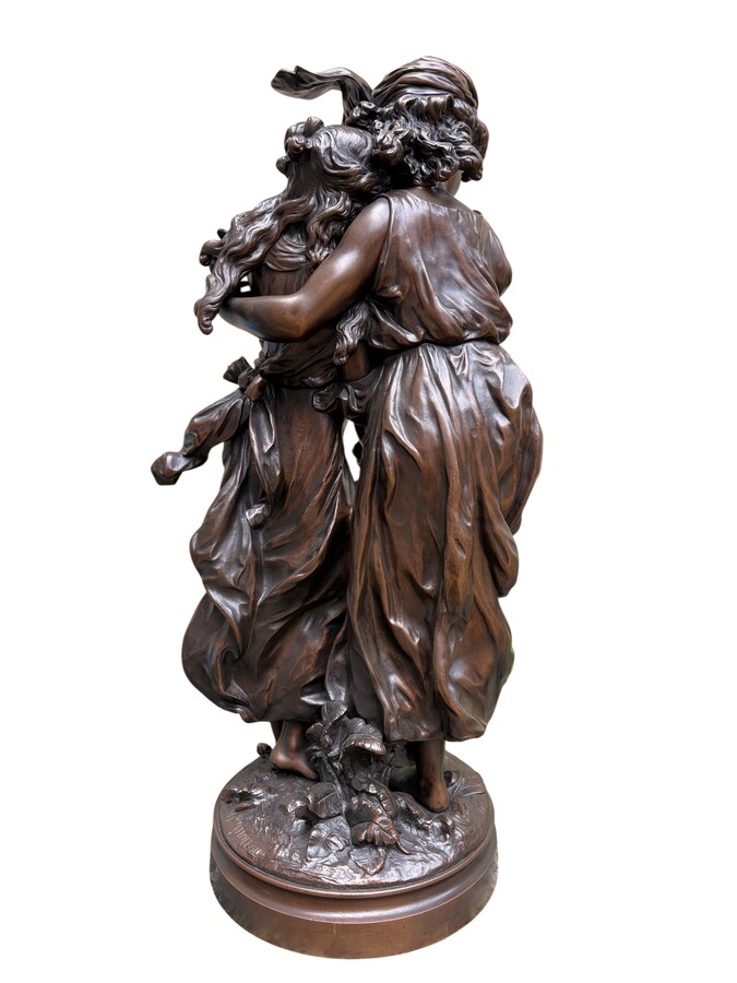 bronze sculpture depicting a young woman with a little girl carrying a basket of flowers. Very finely detailed, signed by Hippolyte Moreau and has a beautiful brown patina. François-Hippolyte Moreau (Dijon 1832–Neuilly-sur-Seine 1926) 