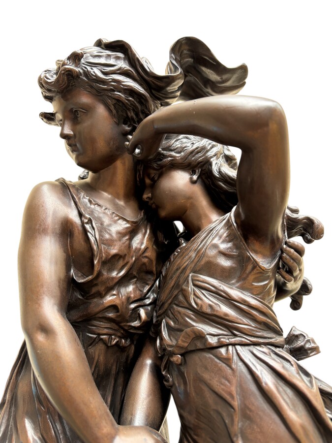 bronze sculpture depicting a young woman with a little girl carrying a basket of flowers. Very finely detailed, signed by Hippolyte Moreau and has a beautiful brown patina. François-Hippolyte Moreau (Dijon 1832–Neuilly-sur-Seine 1926) 