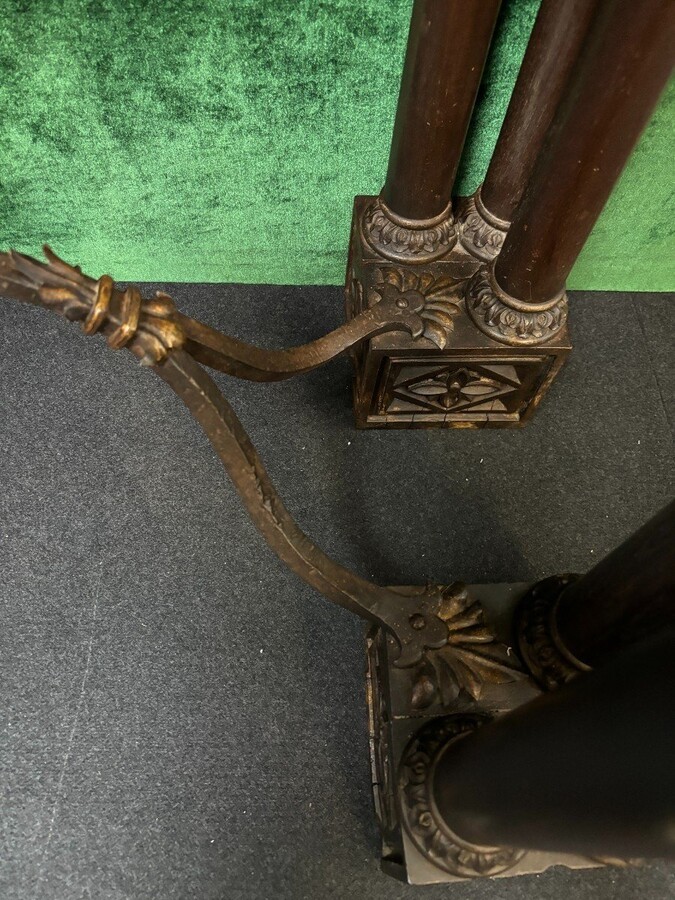 Decorative console/wall table in walnut 19thC. Special console with eagle sculptures in front and on both sides and fitted with 3 columns per leg. The 4 legs are connected with a wrought-iron decoration , the top is in marble Dimensions : Width : 131 cm