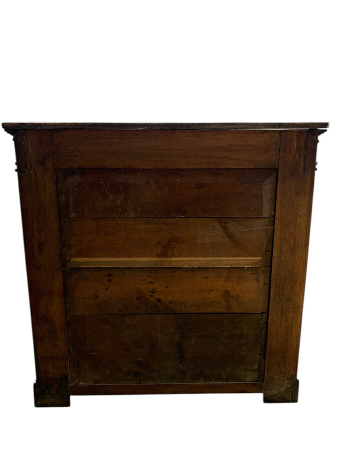 Elegant Empire-style mahogany console table, 19th century. Decorative Empire-style console table adorned with two large patinated female figures, gilded decorations, a mirror at the back and a special marble top.