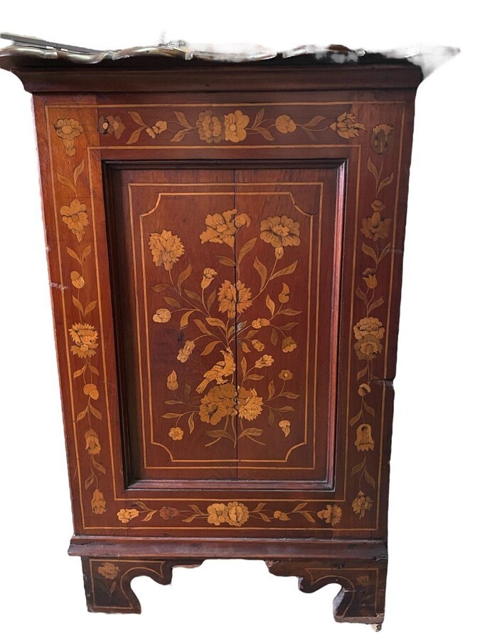 Elegant marquetry display case late 18th century early 19th century Display case in 2 parts with 1 showcase door at the top and 4 curved drawers underneath Furniture in good condition with normal signs of use