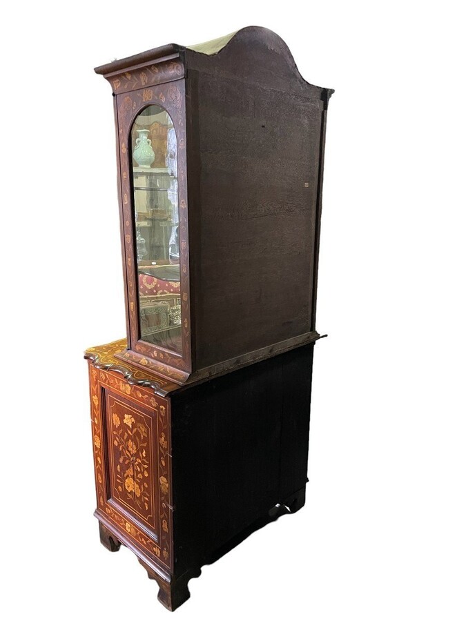 Elegant marquetry display case late 18th century early 19th century Display case in 2 parts with 1 showcase door at the top and 4 curved drawers underneath Furniture in good condition with normal signs of use