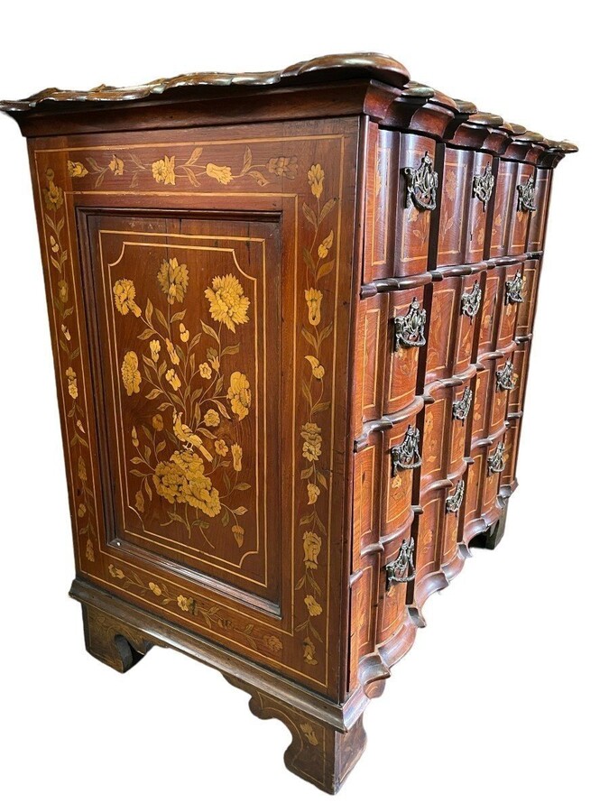 Elegant marquetry display case late 18th century early 19th century Display case in 2 parts with 1 showcase door at the top and 4 curved drawers underneath Furniture in good condition with normal signs of use